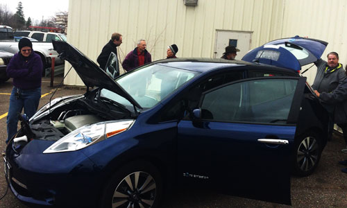 Attendees kick the tires on electric vehicles in Little Falls
