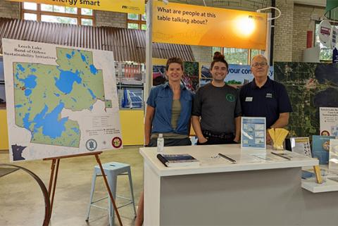 Brandy Toft, Eugene Strowbridge, and Peter Berger (MN Department of Commerce) sharing LLBO’s achievements at the 2022 State Fair EcoExperience.