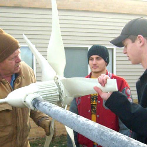 Westbrook-Walnut Grove YES! students helping to install a wind turbine at their school