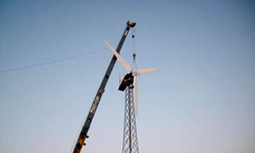 Small wind turbine being installed