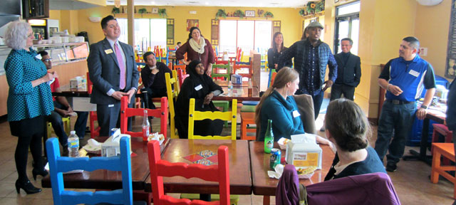 Sade Hashi at Safari Restaurant speaks to the group
