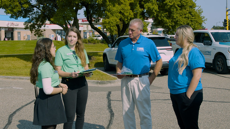 Members of the outreach team connecting with business owners in Eagan.