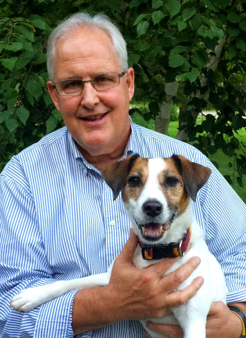 Executive Director Jim Clark and Maddie the dog