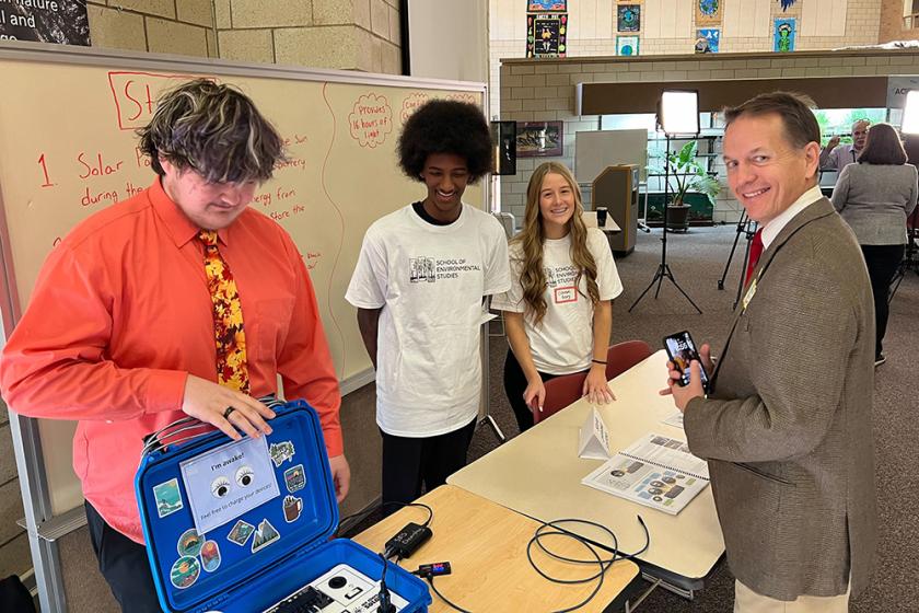 Peter Lindstrom and students at solar ribbon cutting event