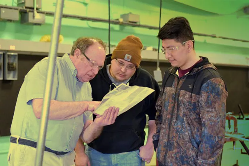 Steve Vietor instructing students learning to become wind & solar electrical technicians.