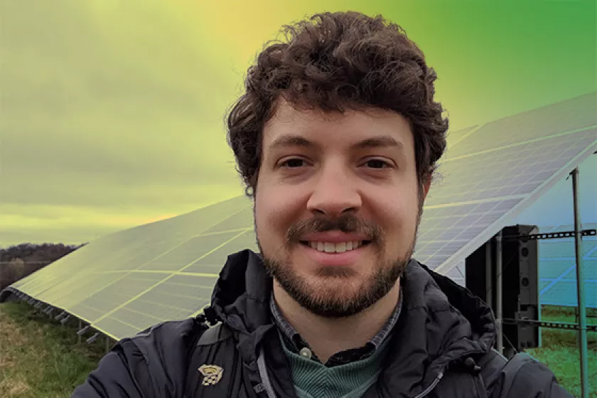 John standing by solar
