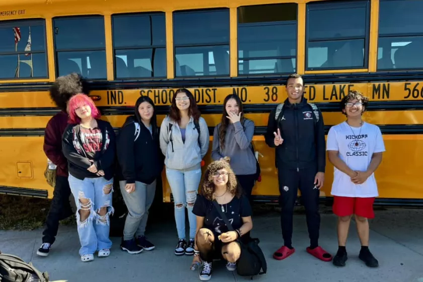 kids in front of bus