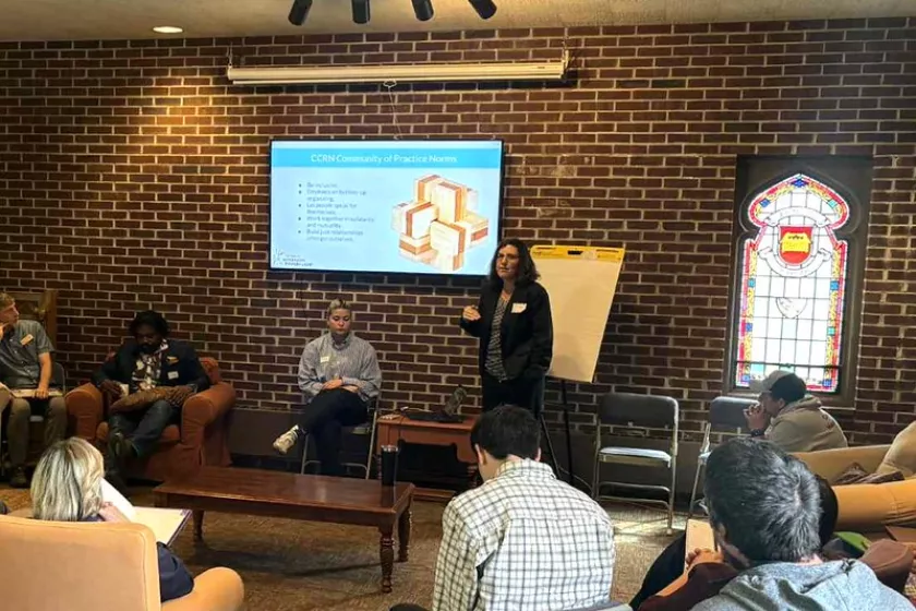 MNIPL’s Julia Nerbonne speaks with the cohort, providing coaching and support.