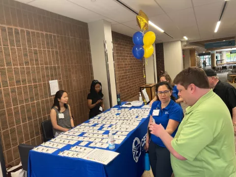 People checking in to the event