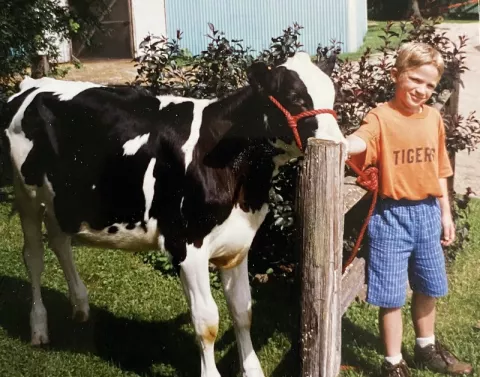 David Schroeder as a kid on his parent’s diairy farm.