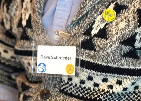 David's name tag and CERTified Community Energy Ambassador pin