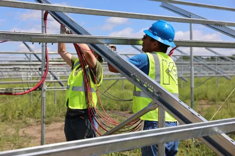 Prairie Island community members helping build the solar array, photo courtesy of Prairie Island Indian Community