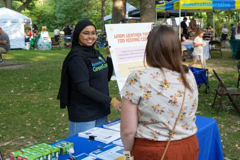 GreenCorps member Zekima presenting a poster