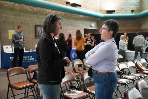 Terri, one of nine Sustainability and Resiliency Commission members, talking with Jennifer Lindahl, Southeast CERT Regional Coordinator 