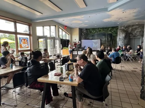 Staff member presenting to a group
