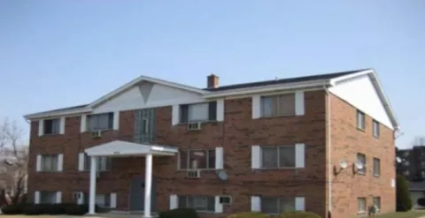 Brick apartment building.