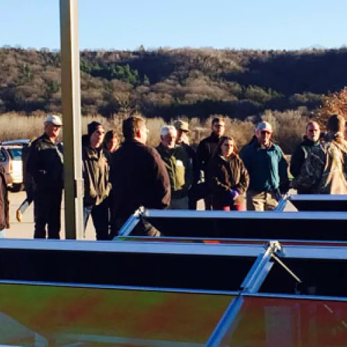 Attendees at Tri-County Electric Cooperative community solar garden tour