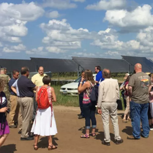 Attendees learn about 10MW solar PV array under construction at Camp Ripley
