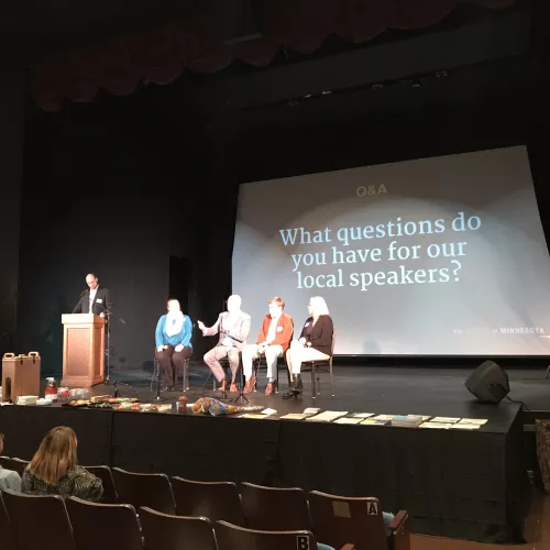 speakers on stage