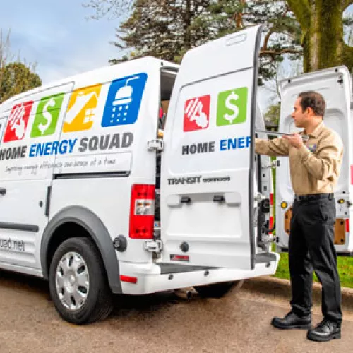 Home Energy Squad truck and worker