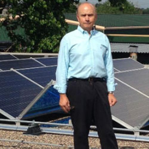 Jay Miller with new solar array on Crankshaft Supply roof