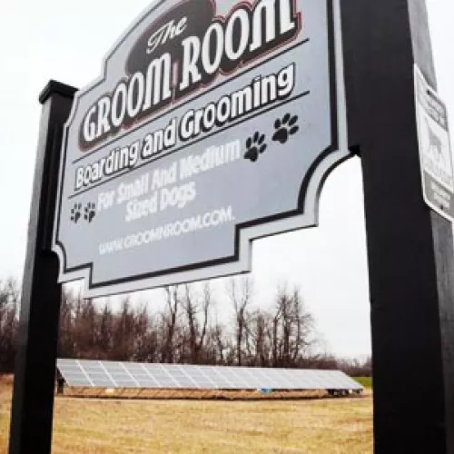 The Groom Room in Hawley, MN with solar array in distance