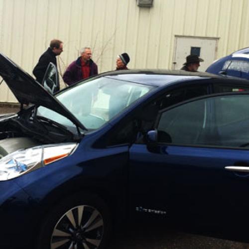 Attendees kick the tires on electric vehicles in Little Falls