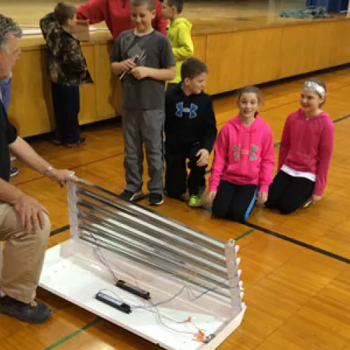 Students learn about new lighting system being installed