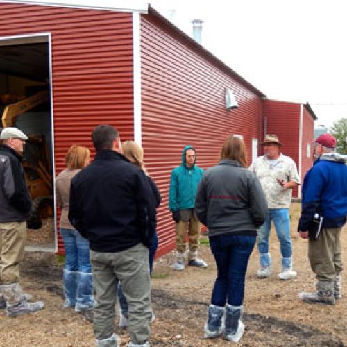 Touring the biomass-heated poultry barn at Viking Company