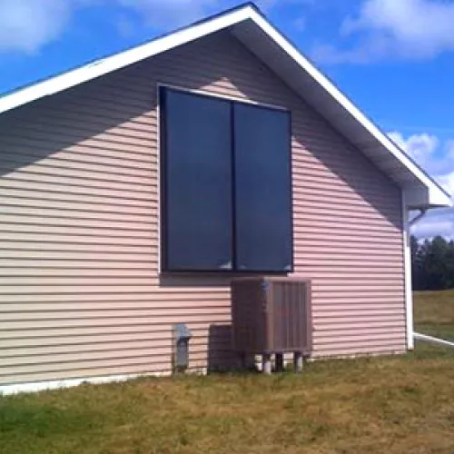house with solar thermal panels