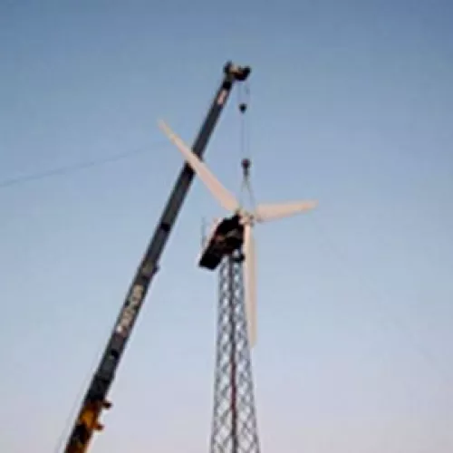 Small wind turbine being installed