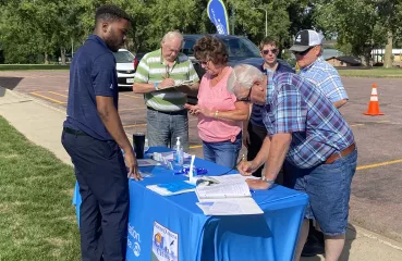 People signing in at ride and drive event