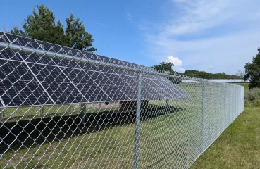 solar panel behind fence