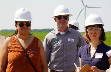 Jason Walker (center) tours a wind farm in Southwest Minnesota with CERTs staff. 