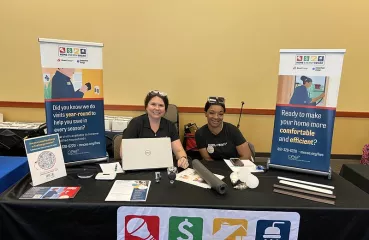 Two NRRC representatives at a booth