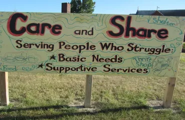 Care and Share’s outdoor welcome sign. 