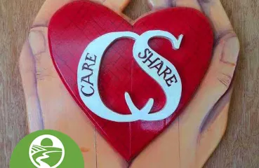 Care Share (image of a heart with "CS" initials held in the center of two palms).