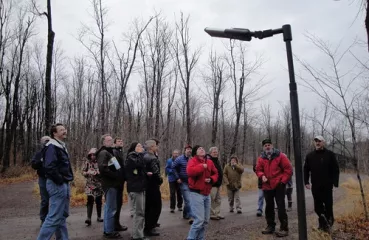 group looking at led lights