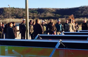 Attendees at Tri-County Electric Cooperative community solar garden tour