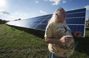 Dave Willard of Forest Lake has been eager to invest in the large, centrally located project called a community solar garden, whose output is credited his bill.