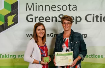 Coon Rapids accepts their award for Step 1 of GreenStep Cities