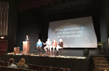 speakers on stage
