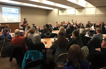 Residents at Minneapolis community solar garden workshop