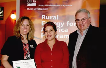 Robin Weis (left) and Gene Metz (right) helped Maria Paarga find funding for energy efficient upgrades in Lupita’s Mexican Restaurant. Alex Chhith/Daily Globe