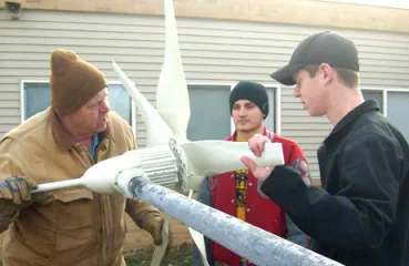 Westbrook-Walnut Grove YES! students helping to install a wind turbine at their school