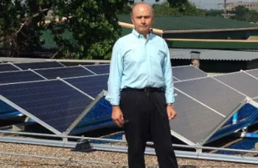 Jay Miller with new solar array on Crankshaft Supply roof