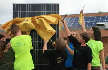 Minnesota students cut the ribbon on a new solar array