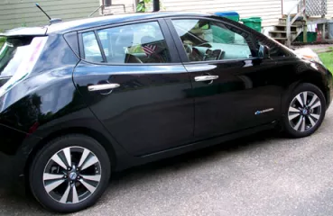Jim Beecher of St. Louis Park drives a 2013 Nissan Leaf