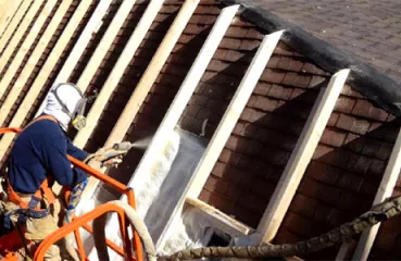 Insulating the roof of Federated Church in Morris