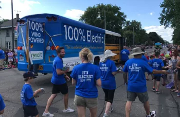 Electric school bus takes part in Lakeville Pan-O-Prog parade